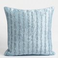 A square Chikankari embroidered light blue cushion pillow with vertical textured stripes, shown against a plain white background.
