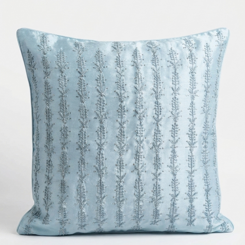 A square Chikankari embroidered light blue cushion pillow with vertical textured stripes, shown against a plain white background.